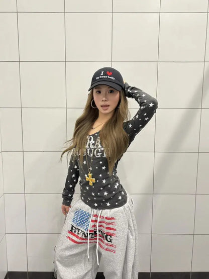 Chic Dollette Hotsweet Grafik-T-Shirts mit Sternenprint, schmal geschnitten, Langarm, 2000er Kleidung, Rundhalsausschnitt, Herbsttop, koreanische Mode-Tees