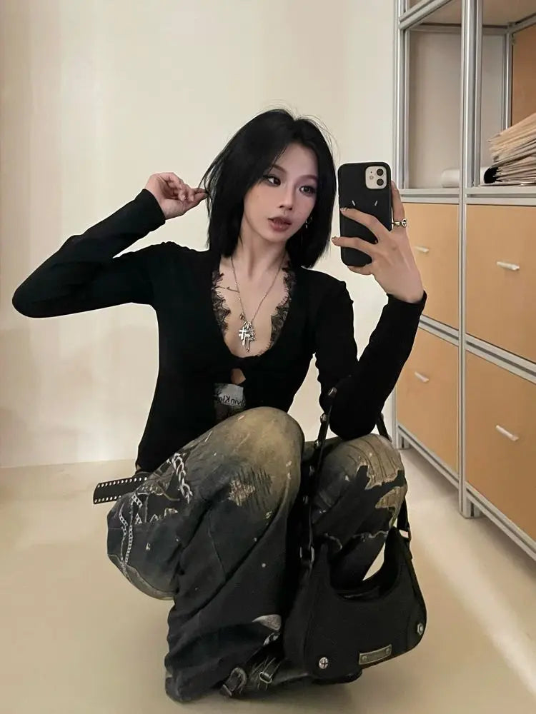 Schicker Dollette Gothic schwarzer hohler Body Strampler Jumpsuit Fashion einfarbige Spitze Langarm sexy Etui Skinny T-Shirt