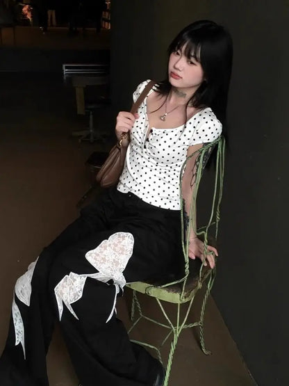 T-shirt Chic Dollette Blanc à Pois Manches Épaules Été Nouveau Produit Design Sens Niche Spicy Girl Haut Court Moulant à Porter Extérieurement